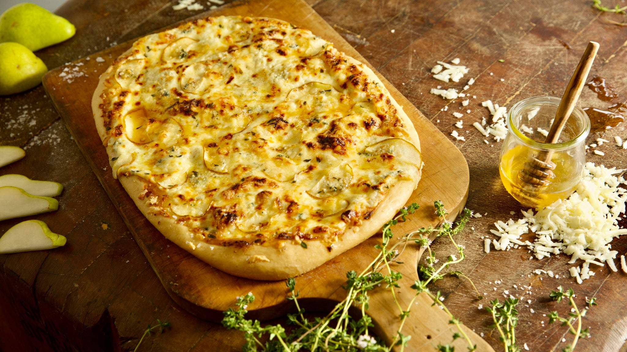 Pear and Gorgonzola Pizza Drizzled with Honey